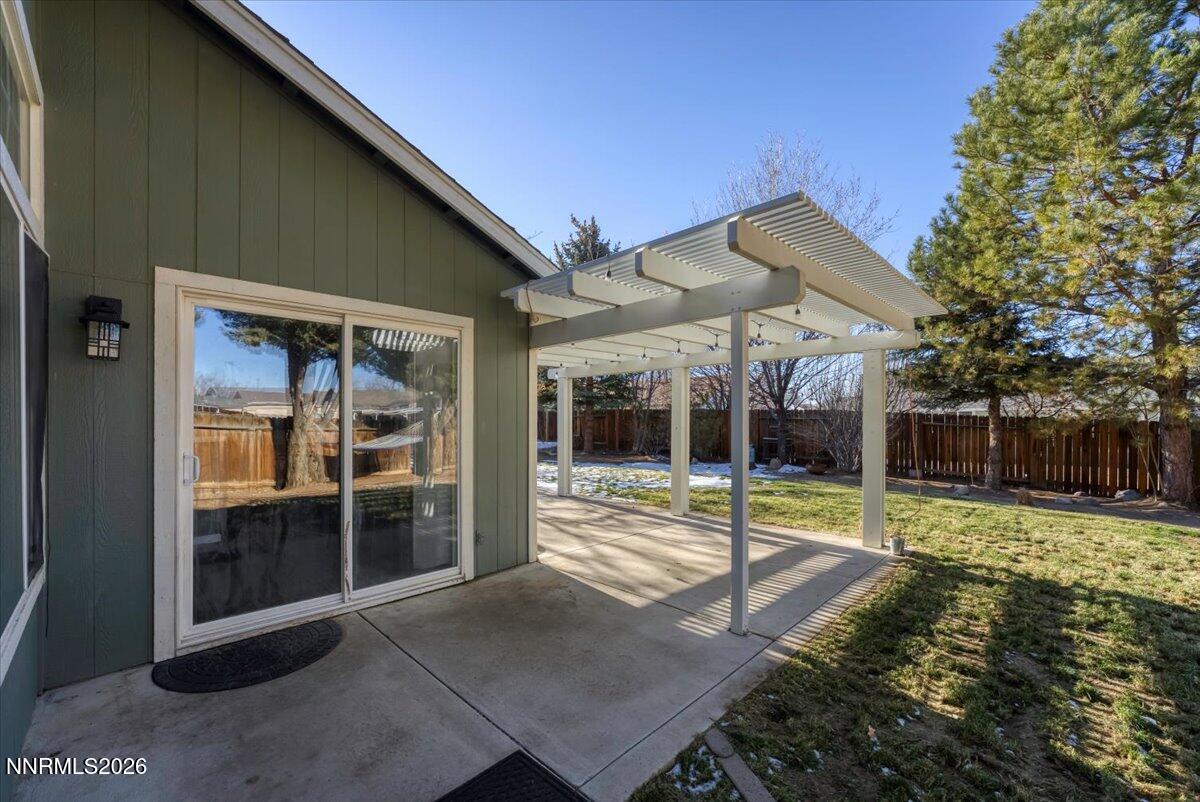 7663 La Ramba Drive Sparks, NV 89436 - Photo 23 of 27 a view of a house with backyard and porch