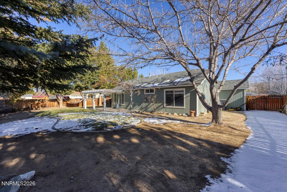 7663 La Ramba Drive Sparks, NV 89436 - Photo 26 of 27 a front view of a house with a yard