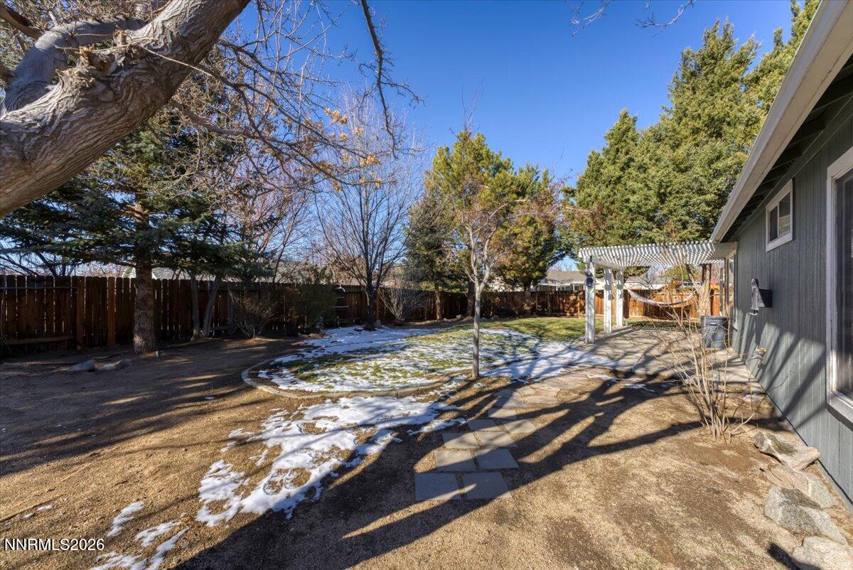 7663 La Ramba Drive Sparks, NV 89436 - Photo 27 of 27 a view of a backyard with a tree
