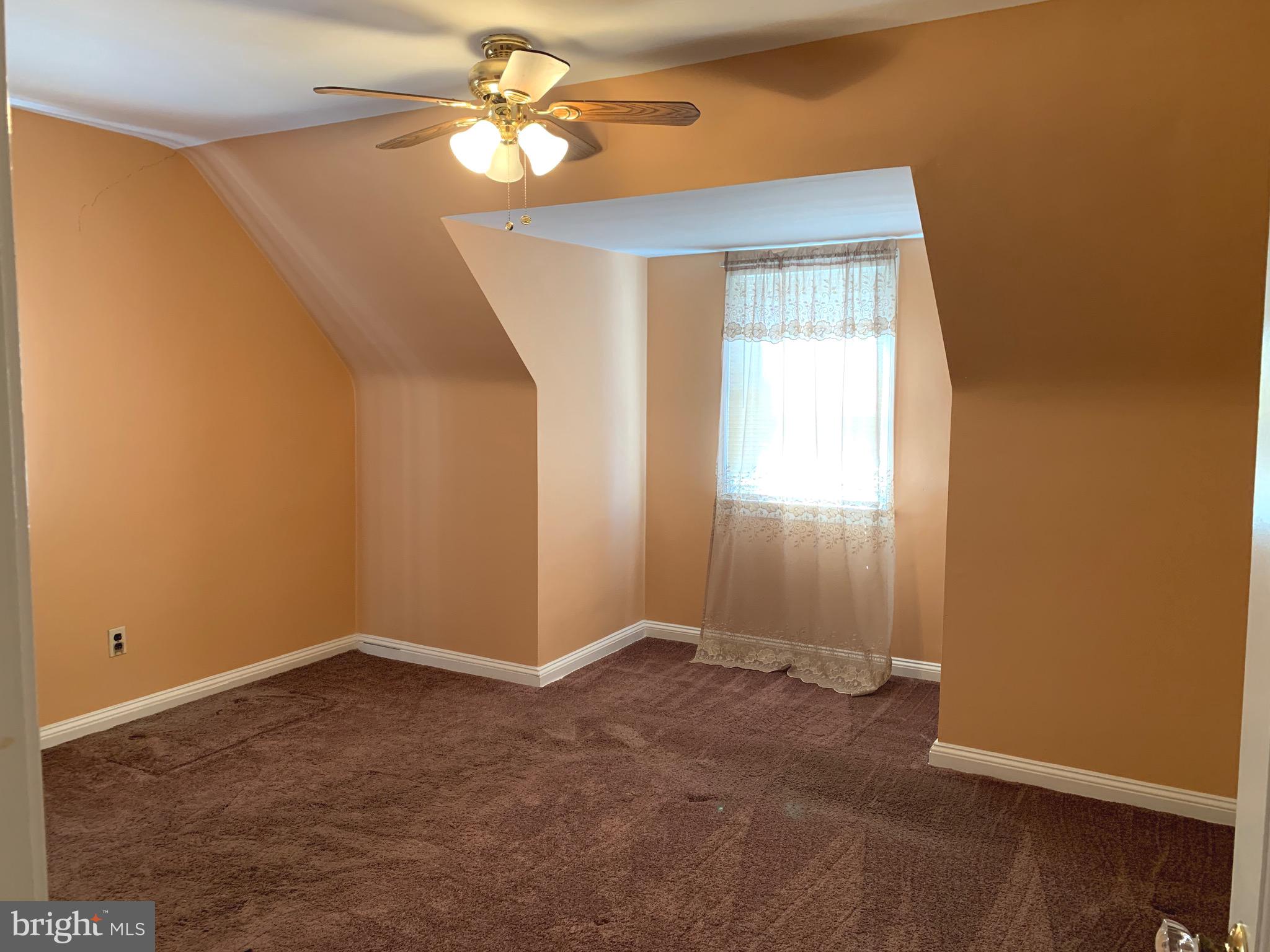 640 Laurel Road Springfield, PA 19064 - Photo 15 of 30 a view of a chandelier fan in a room
