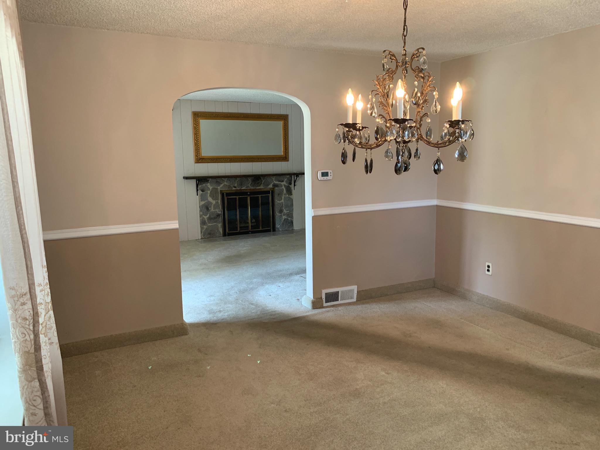 640 Laurel Road Springfield, PA 19064 - Photo 8 of 30 a view of a livingroom with a fireplace
