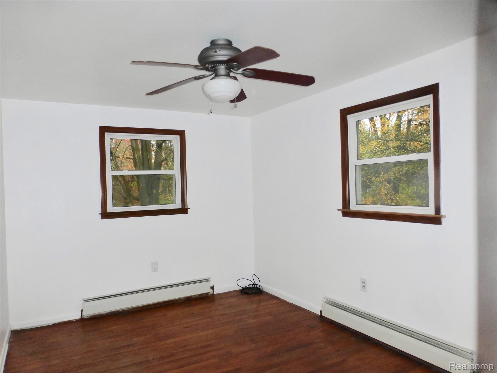 7761 South Eston Road Clarkston, MI 48348 - Photo 19 of 31 Beautiful wood flooring