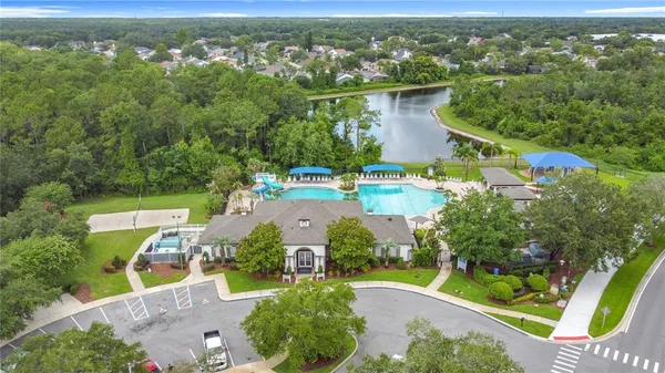 an aerial view of residential house with outdoor space