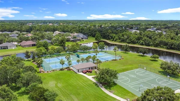 a view of a golf course with a swimming pool
