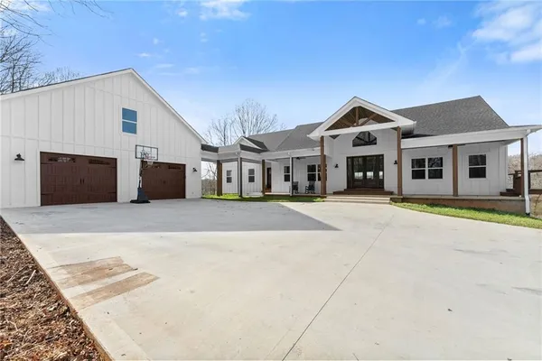 a front view of a house with a outdoor space