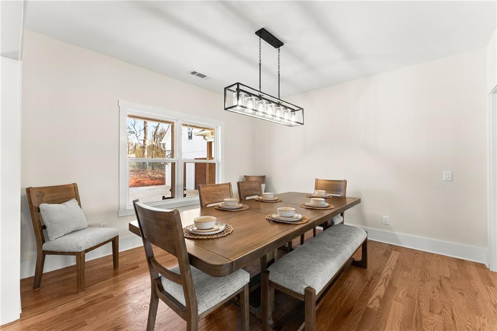 201 Fred Pitts Road Demorest, GA 30535 - Photo 12 of 55 a view of a dining room with furniture window and wooden floor