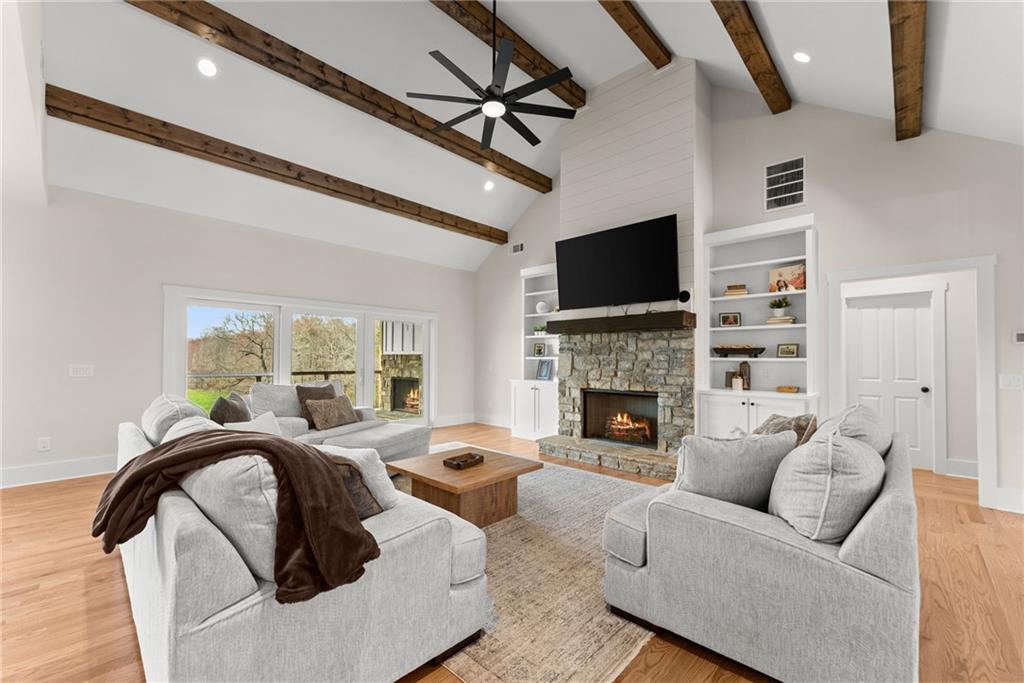 201 Fred Pitts Road Demorest, GA 30535 - Photo 14 of 55 a living room with furniture fireplace and a flat screen tv