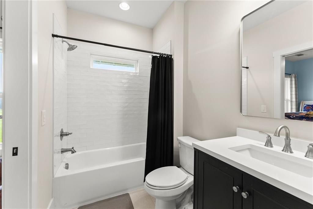 201 Fred Pitts Road Demorest, GA 30535 - Photo 30 of 55 a bathroom with a granite countertop sink toilet and shower