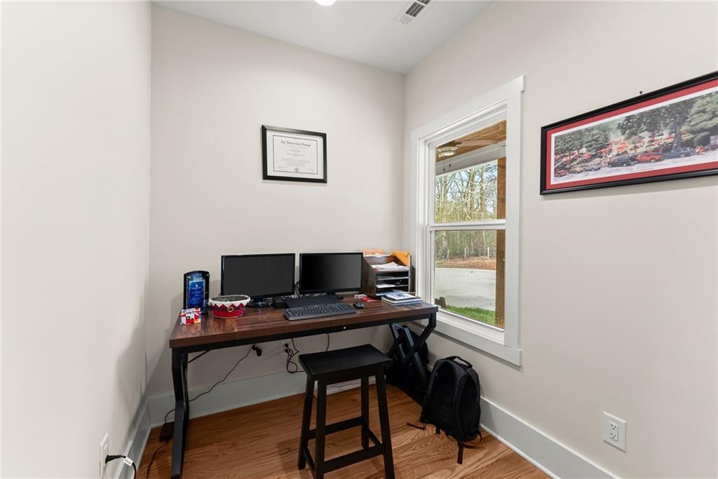 201 Fred Pitts Road Demorest, GA 30535 - Photo 34 of 55 a view of a workspace with furniture and a window