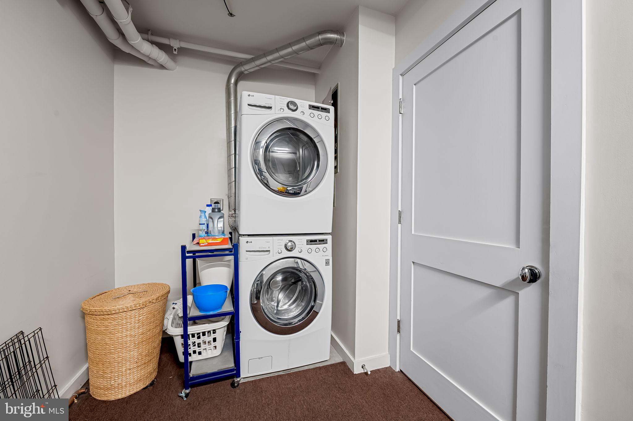 1220 Bank Street, Unit 407 Baltimore, MD 21202 - Photo 41 of 52 a utility room with dryer and washer