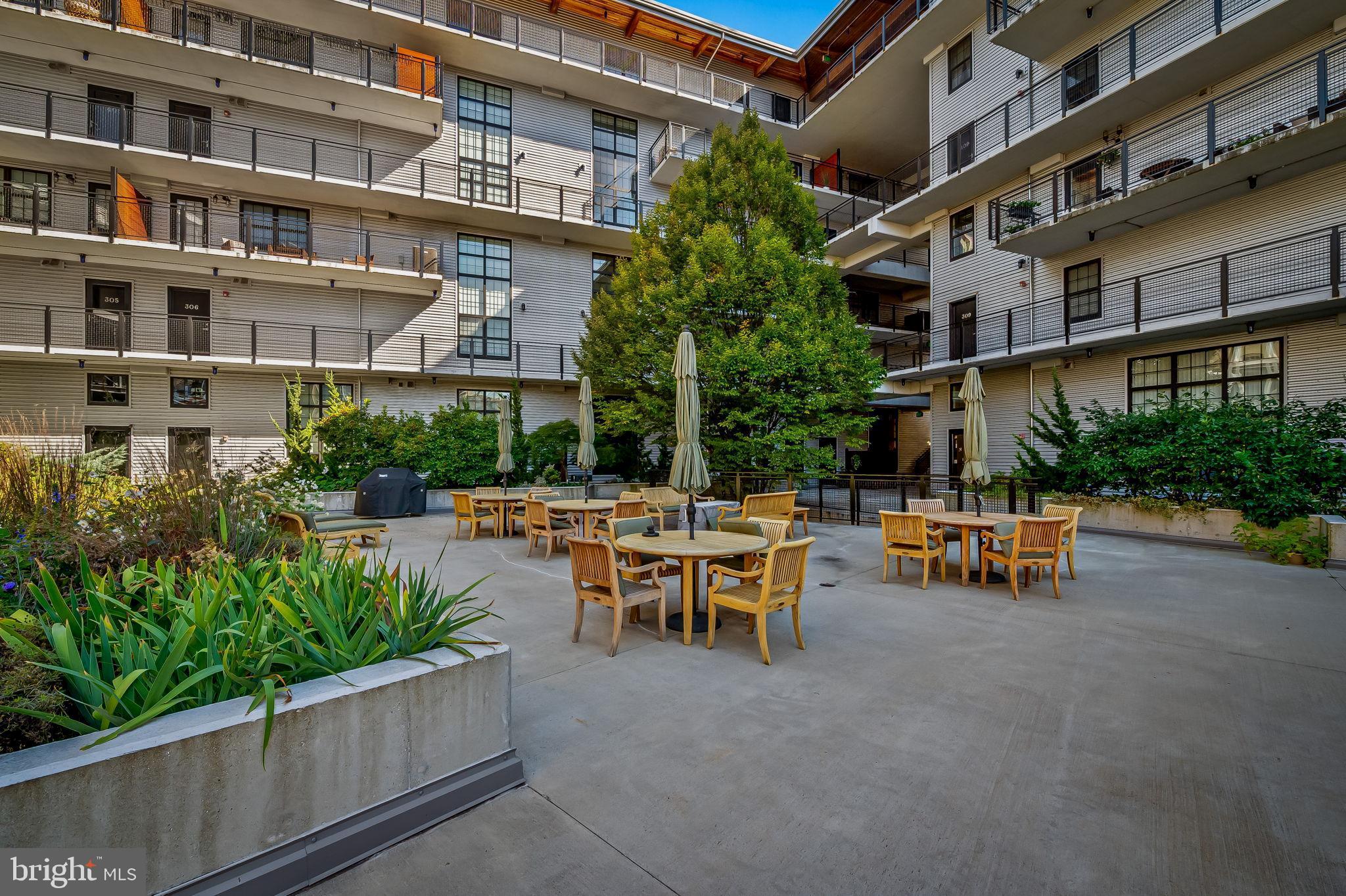 1220 Bank Street, Unit 407 Baltimore, MD 21202 - Photo 43 of 52 a view of a building with sitting area