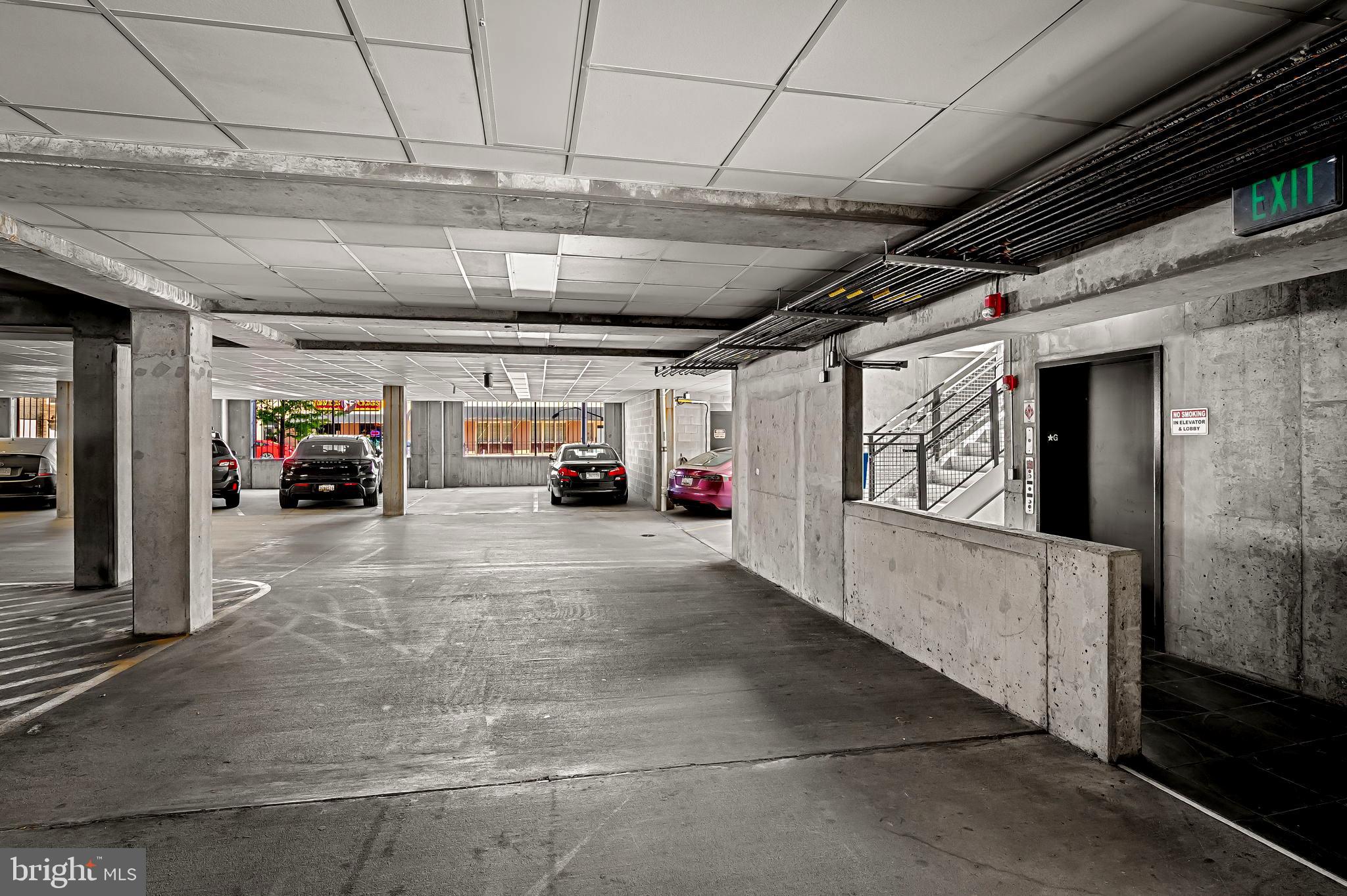 1220 Bank Street, Unit 407 Baltimore, MD 21202 - Photo 45 of 52 a view of parking garage with cars