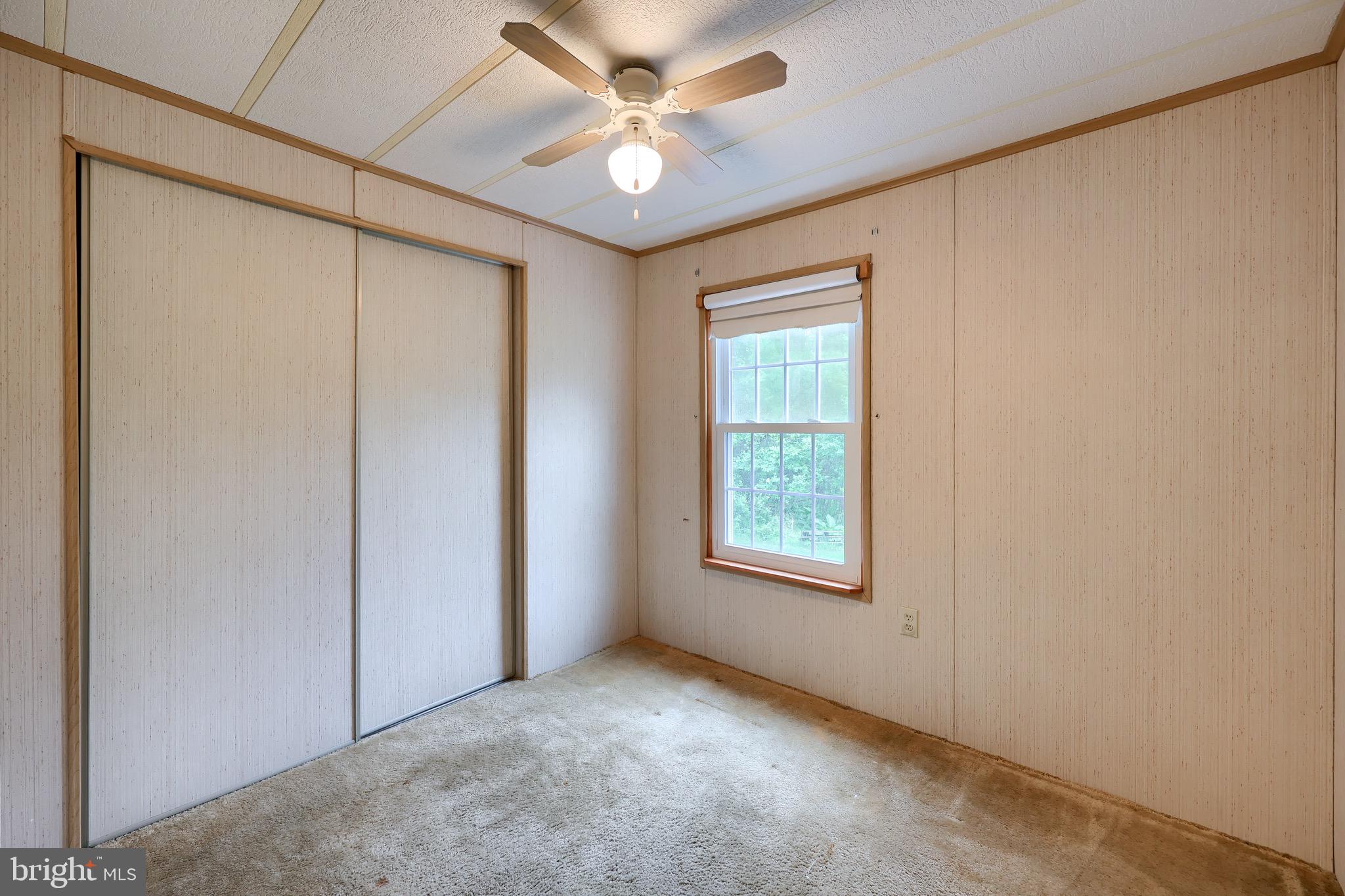 109 Maple Avenue Manheim, PA 17545 - Photo 29 of 39 an empty room with windows and fan