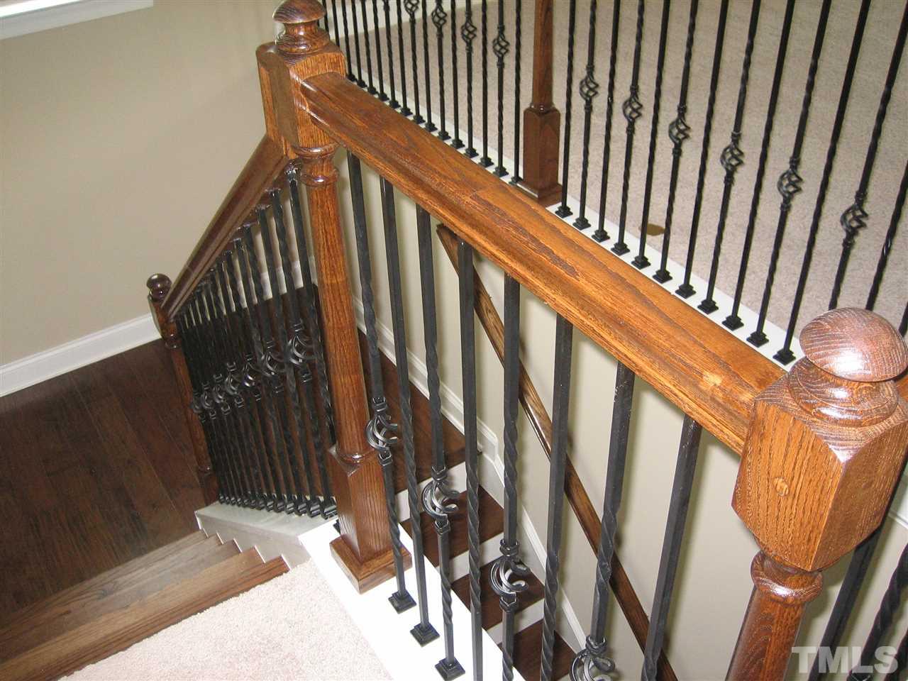 3605 Greenville Loop Road Wake Forest, NC 27587 - Photo 14 of 25 Hardwoods at stairs w/Wrought Iron Spindles - Beautiful