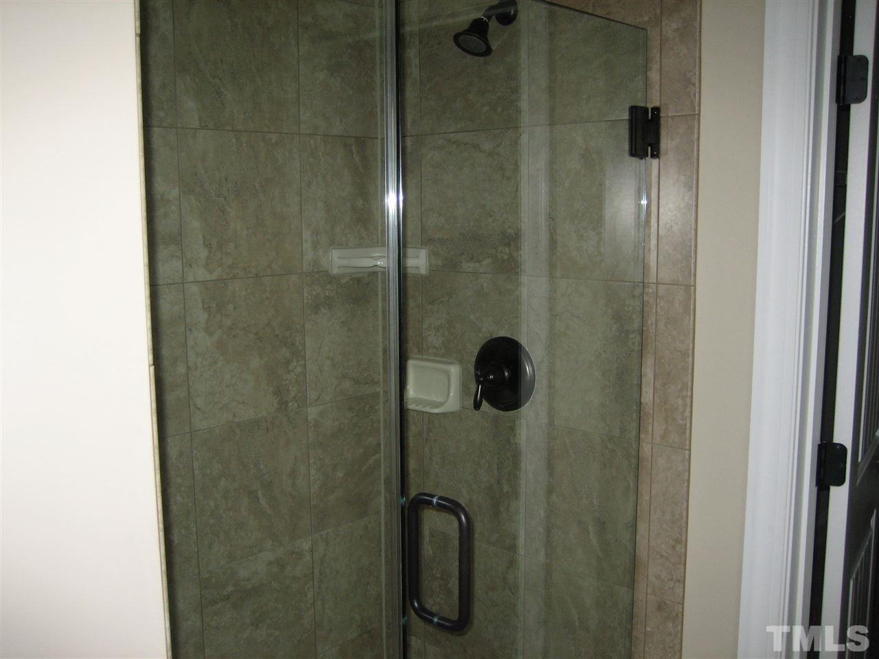 3605 Greenville Loop Road Wake Forest, NC 27587 - Photo 18 of 25 Frameless shower door - tile shower