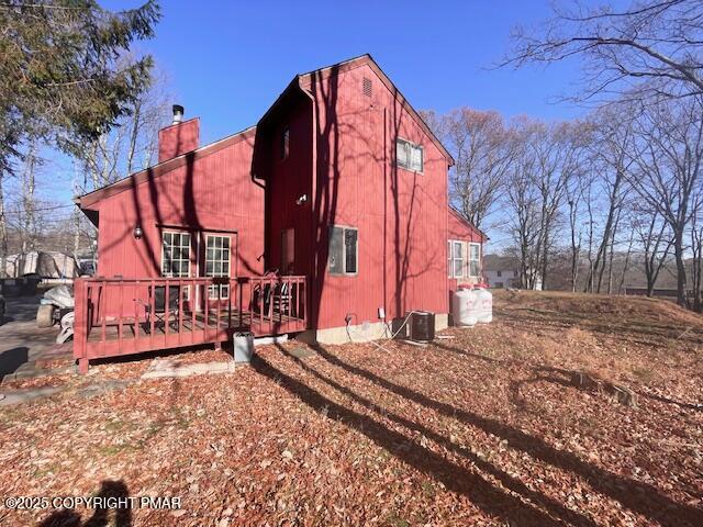 139 Mountain Top Circle Bushkill, PA 18324 - Photo 3 of 21 a view of a backyard with wooden fence
