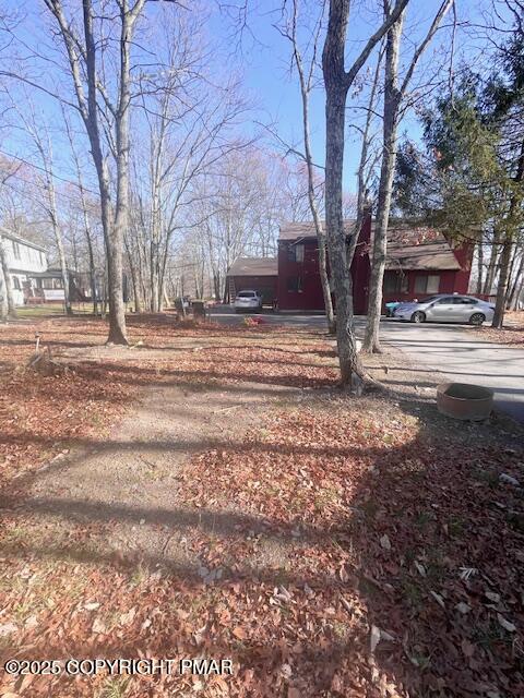 139 Mountain Top Circle Bushkill, PA 18324 - Photo 5 of 21 a view of road with trees