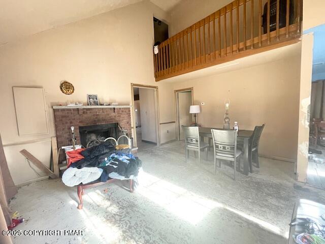139 Mountain Top Circle Bushkill, PA 18324 - Photo 8 of 21 a living room with furniture a fireplace and white walls