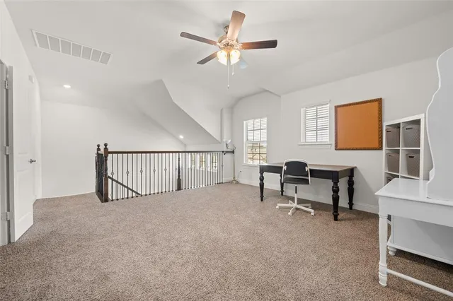 a view of livingroom with furniture and a window