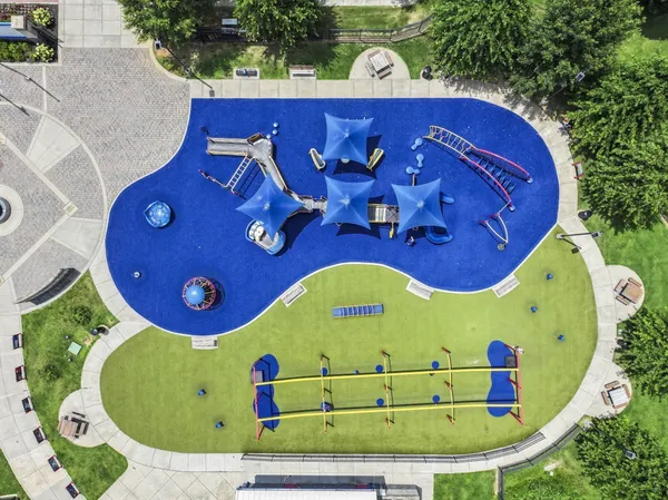 a sign board with a play ground