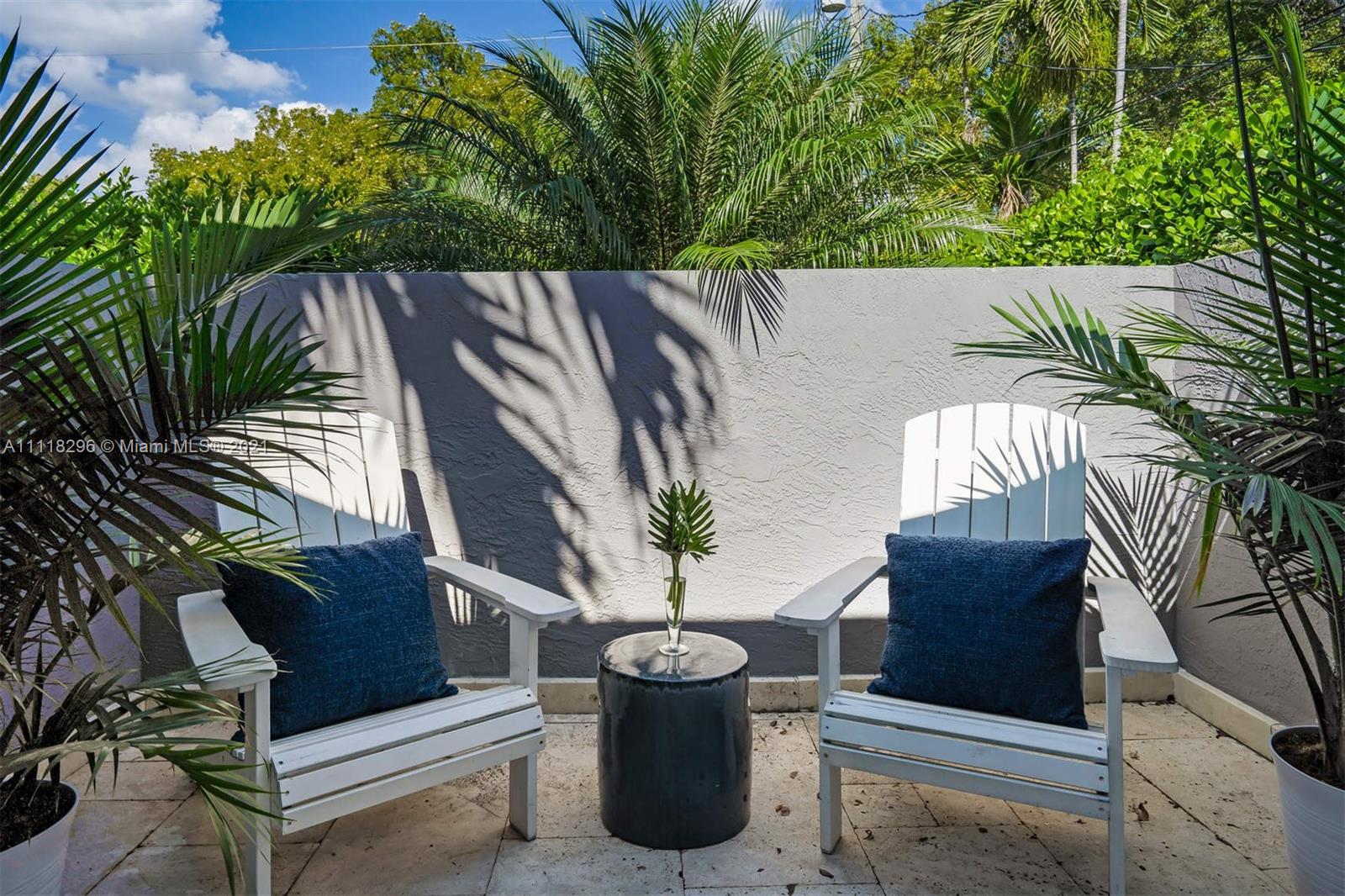 1690 Cleveland Road Miami Beach, FL 33141 - Photo 12 of 29 a view of balcony with a potted plant and outdoor seating