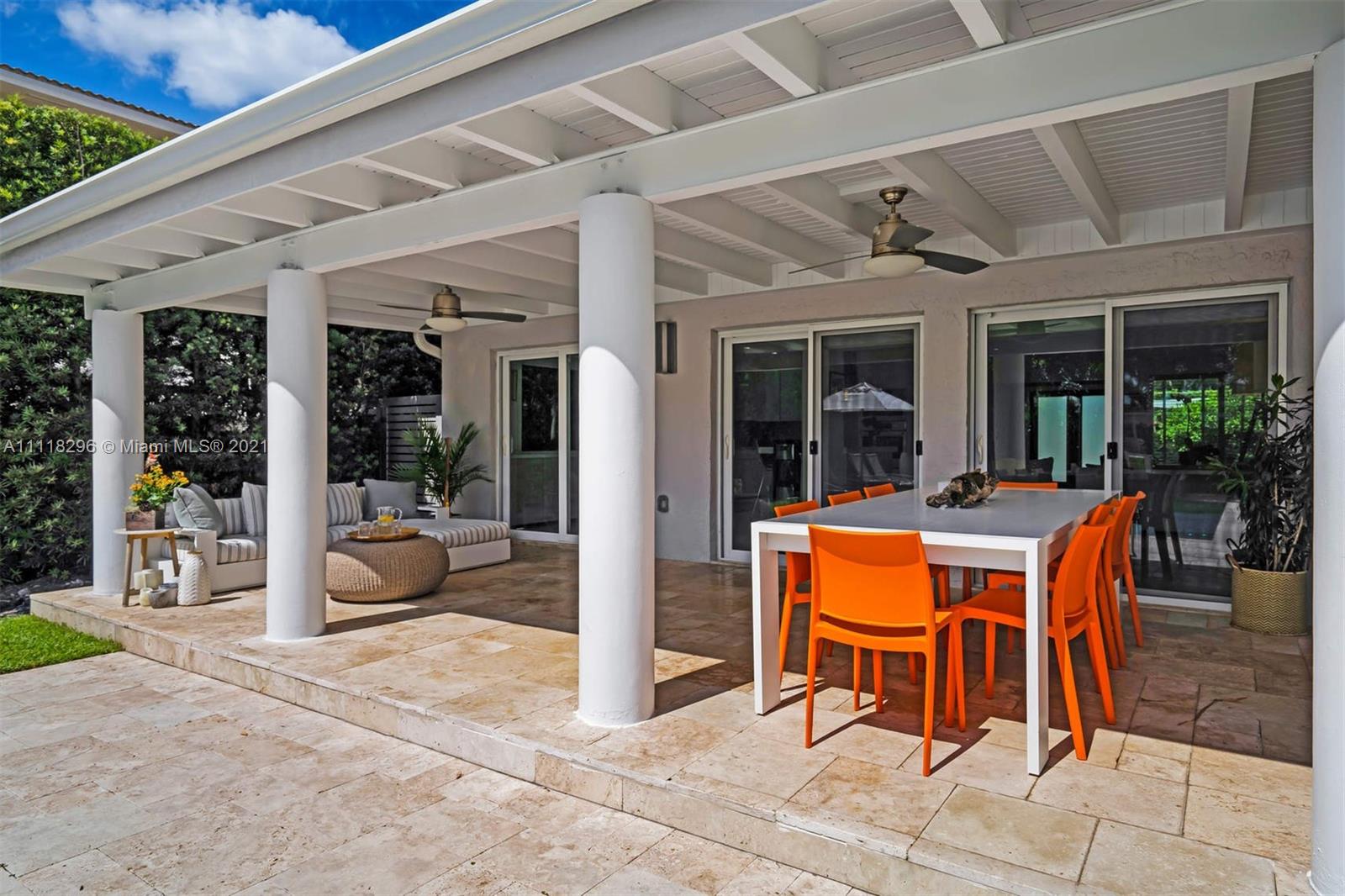 1690 Cleveland Road Miami Beach, FL 33141 - Photo 15 of 29 a patio with yard glass top table and chairs