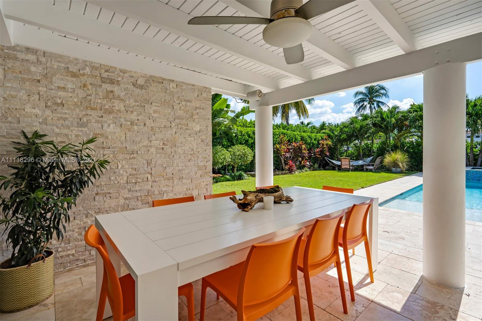 1690 Cleveland Road Miami Beach, FL 33141 - Photo 16 of 29 a view of an outdoor dining space with a table and chairs
