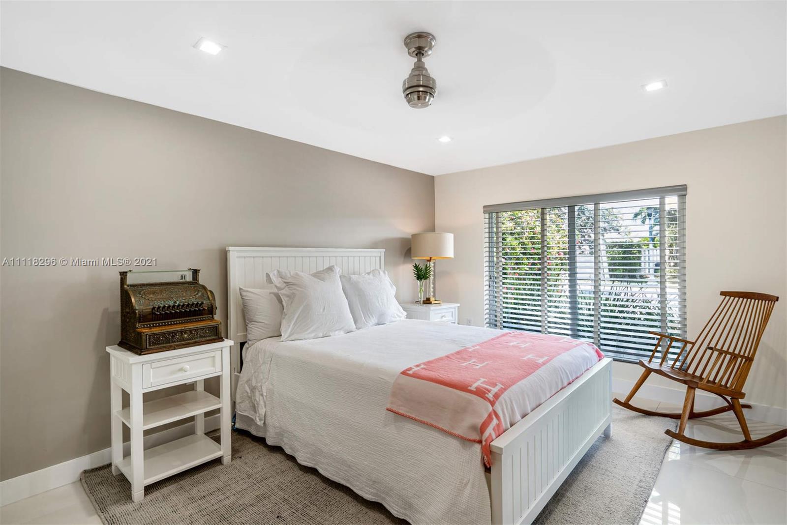 1690 Cleveland Road Miami Beach, FL 33141 - Photo 20 of 29 a bedroom with a bed and a window