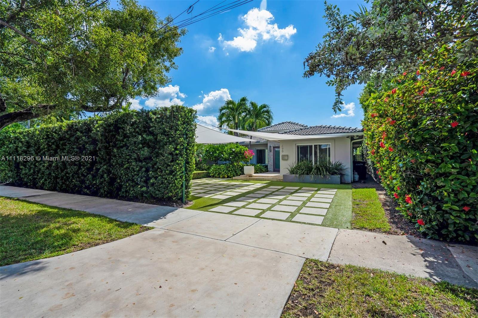 1690 Cleveland Road Miami Beach, FL 33141 - Photo 5 of 29 a view of house with garden space and swimming pool