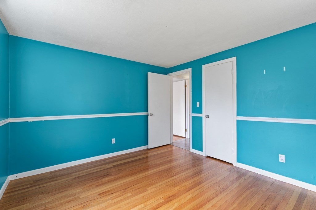 151 Garnet Street Springfield, MA 01129 - Photo 20 of 41 a view of empty room with wooden floor