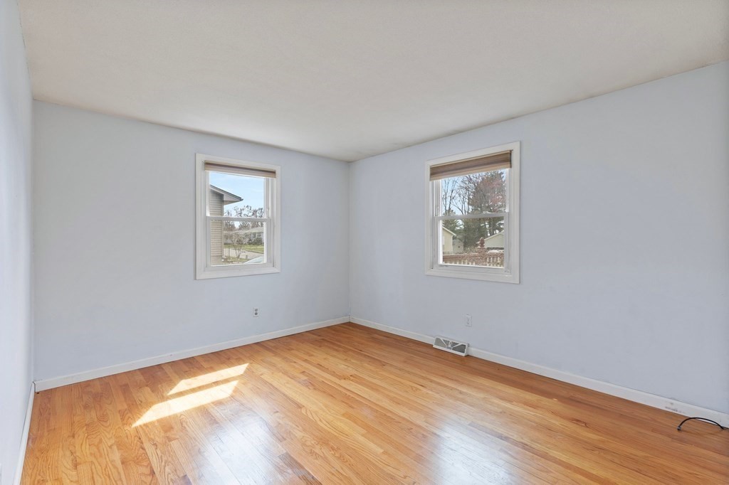 151 Garnet Street Springfield, MA 01129 - Photo 21 of 41 a view of empty room with wooden floor