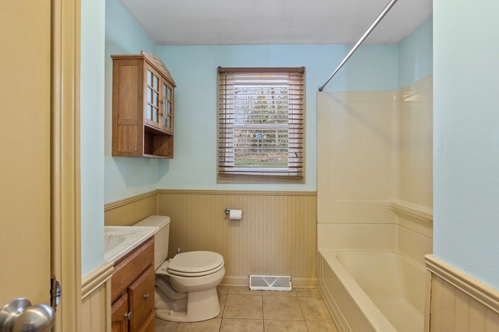 151 Garnet Street Springfield, MA 01129 - Photo 25 of 41 a bathroom with a toilet a sink and a bathtub