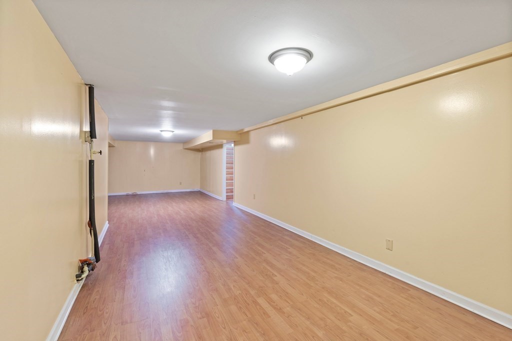 151 Garnet Street Springfield, MA 01129 - Photo 30 of 41 a view of empty room with wooden floor