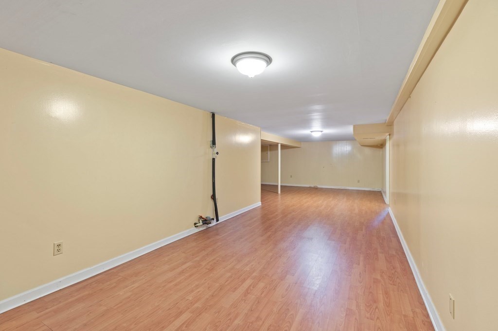 151 Garnet Street Springfield, MA 01129 - Photo 31 of 41 a view of a room with wooden floor