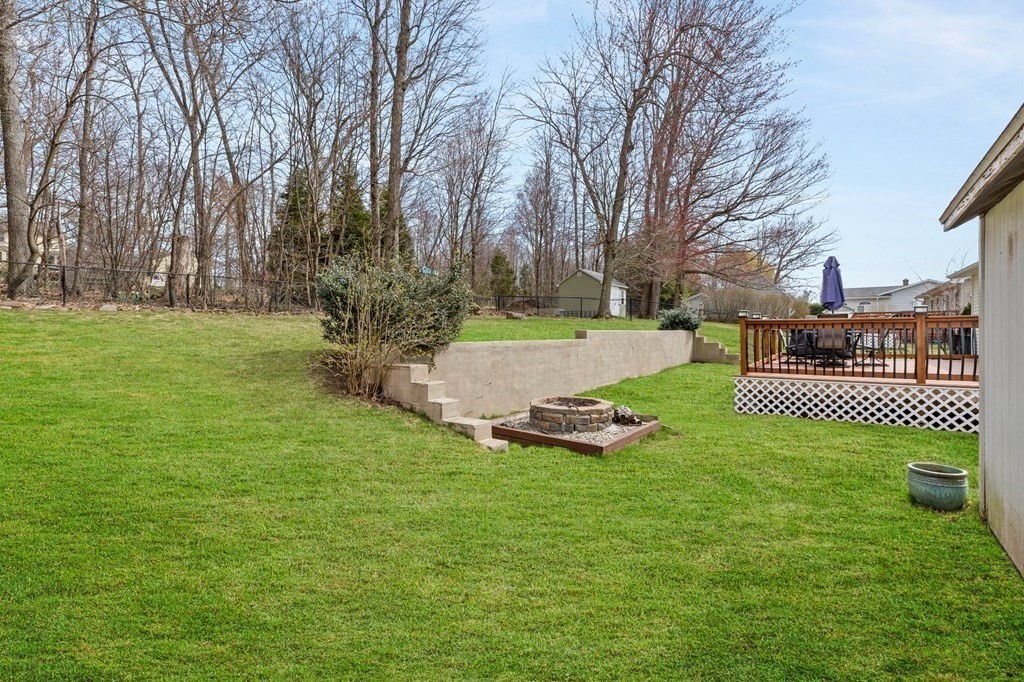 151 Garnet Street Springfield, MA 01129 - Photo 38 of 41 a view of a backyard with a garden