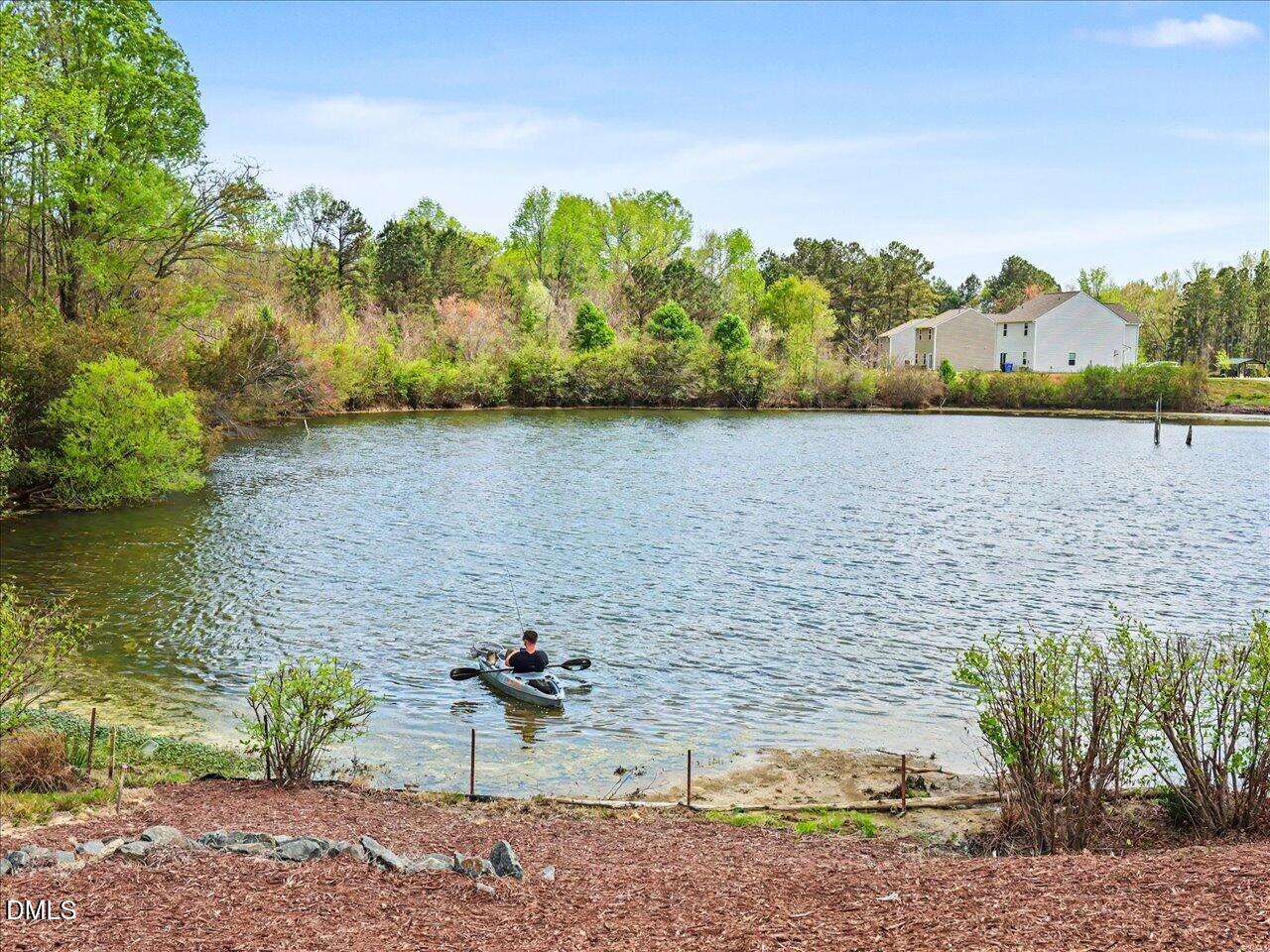 90 Barnsley Road Angier, NC 27501 - Photo 2 of 40 a view of a lake view