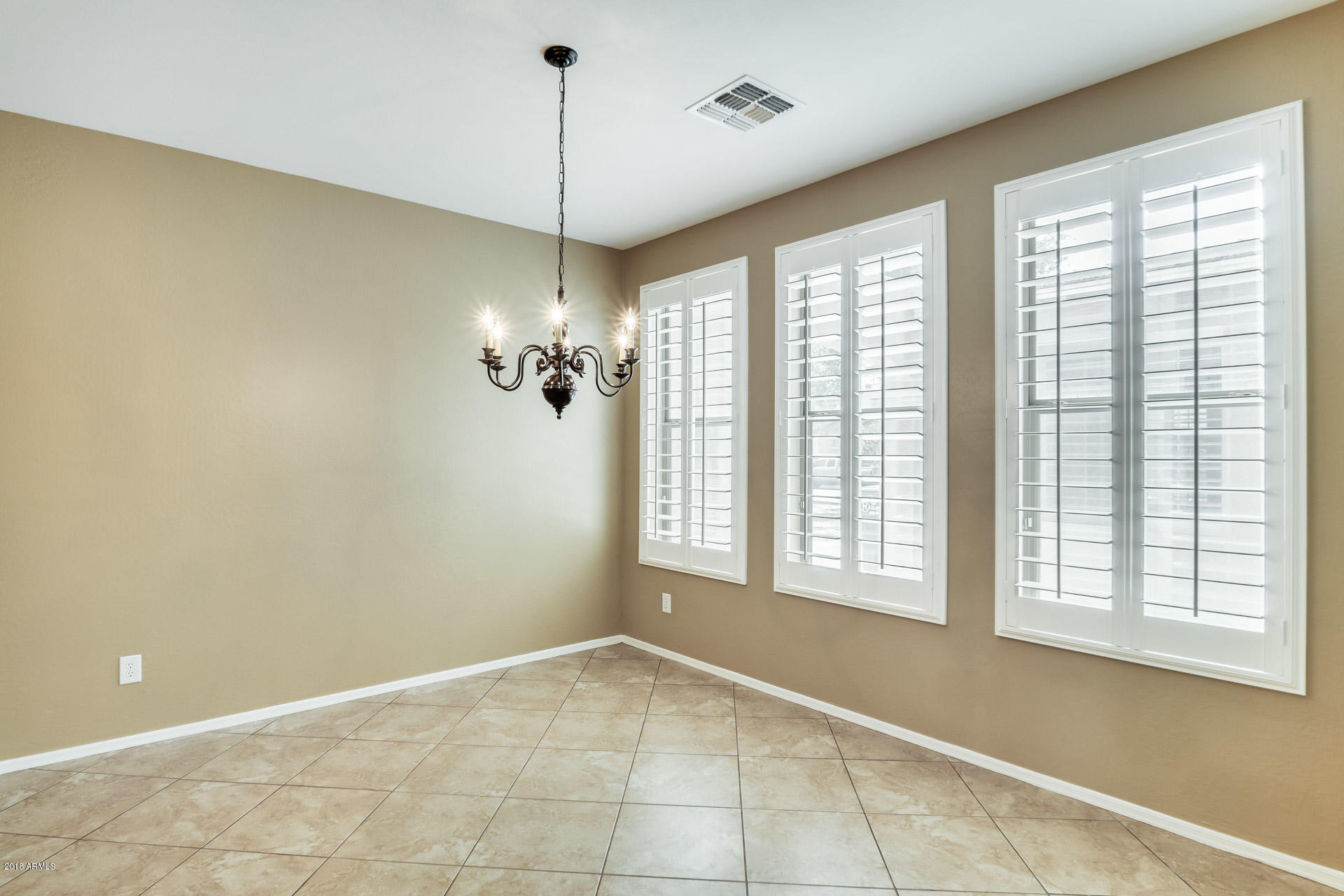 3250 East Blue Ridge Way Gilbert, AZ 85298 - Photo 15 of 44 a view of an empty room with a window