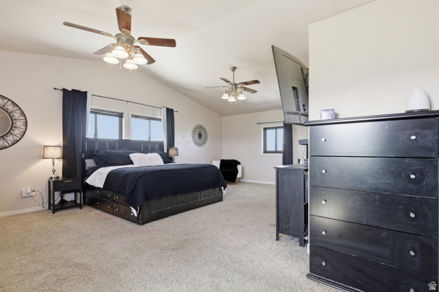 830 North Stone Road Snowville, UT 84336 - Photo 24 of 69 Bedroom with ceiling fan, light carpet, and multiple windows