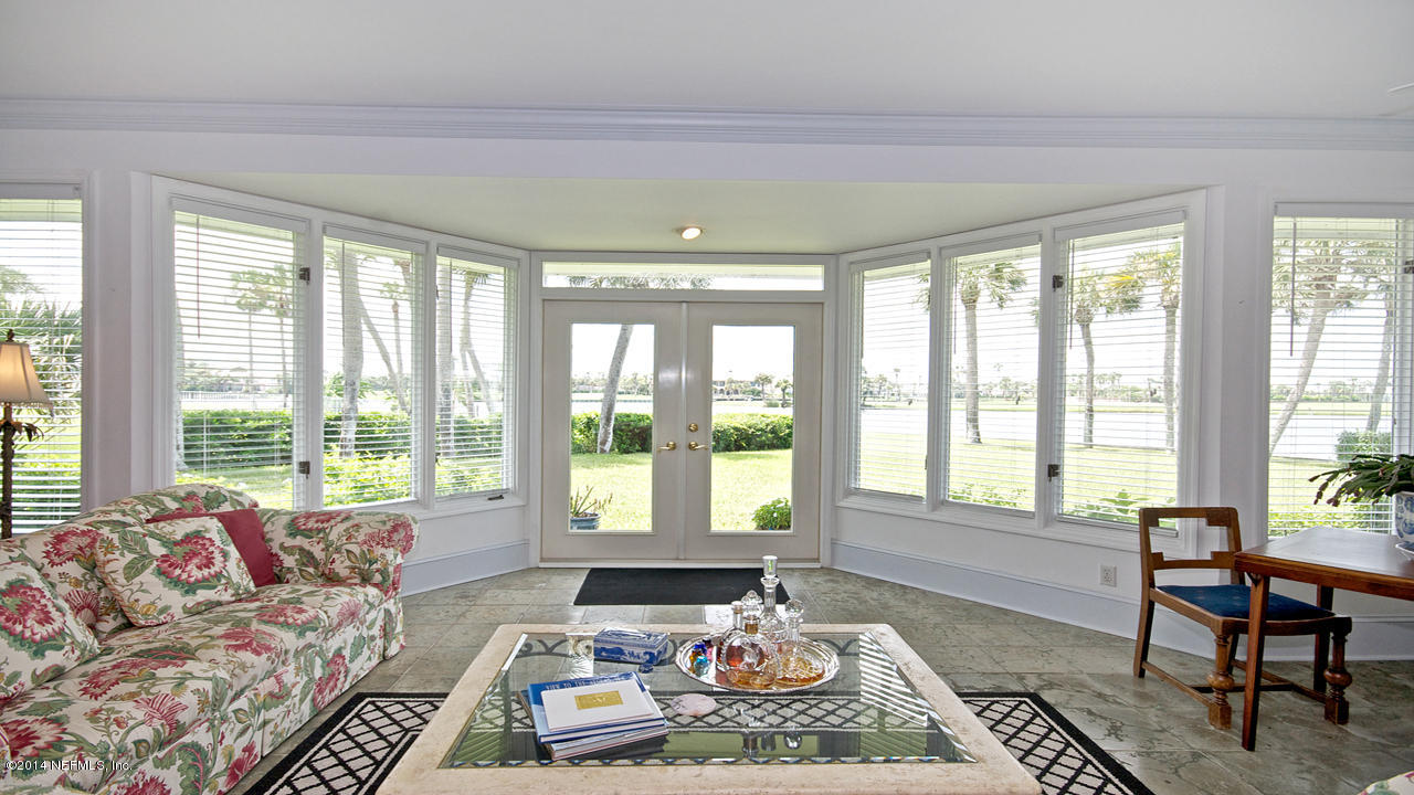 5 Solana Road Ponte Vedra Beach, FL 32082 - Photo 5 of 28 a living room with furniture and a large window