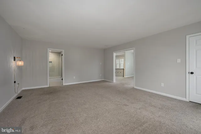 a bathroom with a double vanity sink mirror double and shower