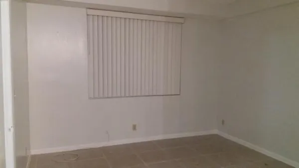 a bathroom with a toilet a sink and bathtub