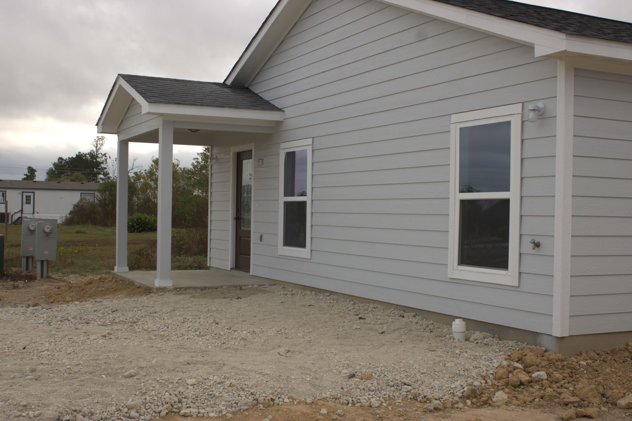 338 Road 5840 Cleveland, TX 77327 - Photo 3 of 12 a backyard of a house with table and chairs