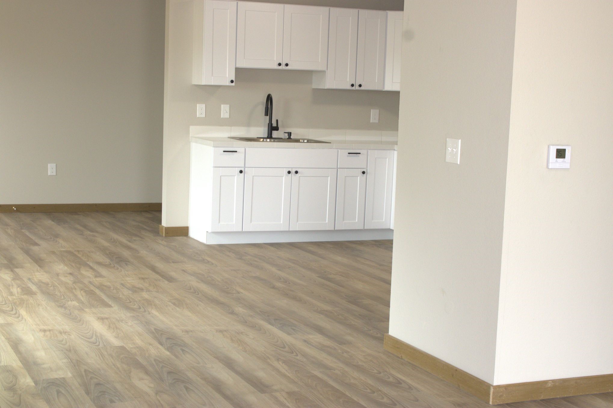 338 Road 5840 Cleveland, TX 77327 - Photo 4 of 12 a kitchen with stainless steel appliances granite countertop a sink and cabinets