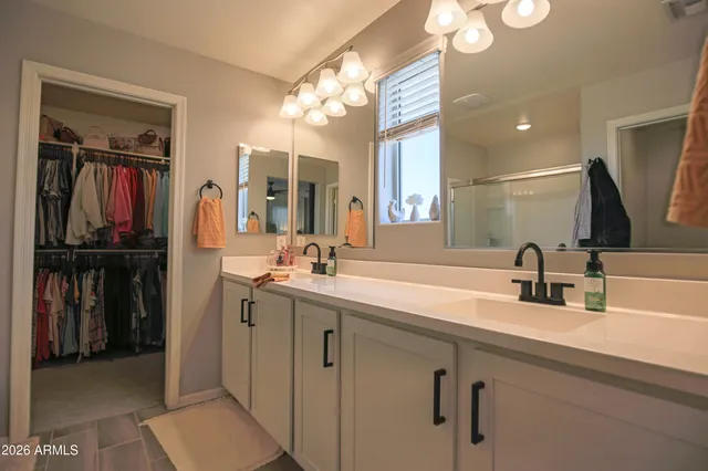 a bathroom with a toilet and a shower curtain