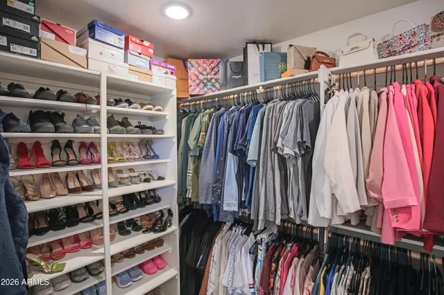 a view of a livingroom with furniture and hardwood floor
