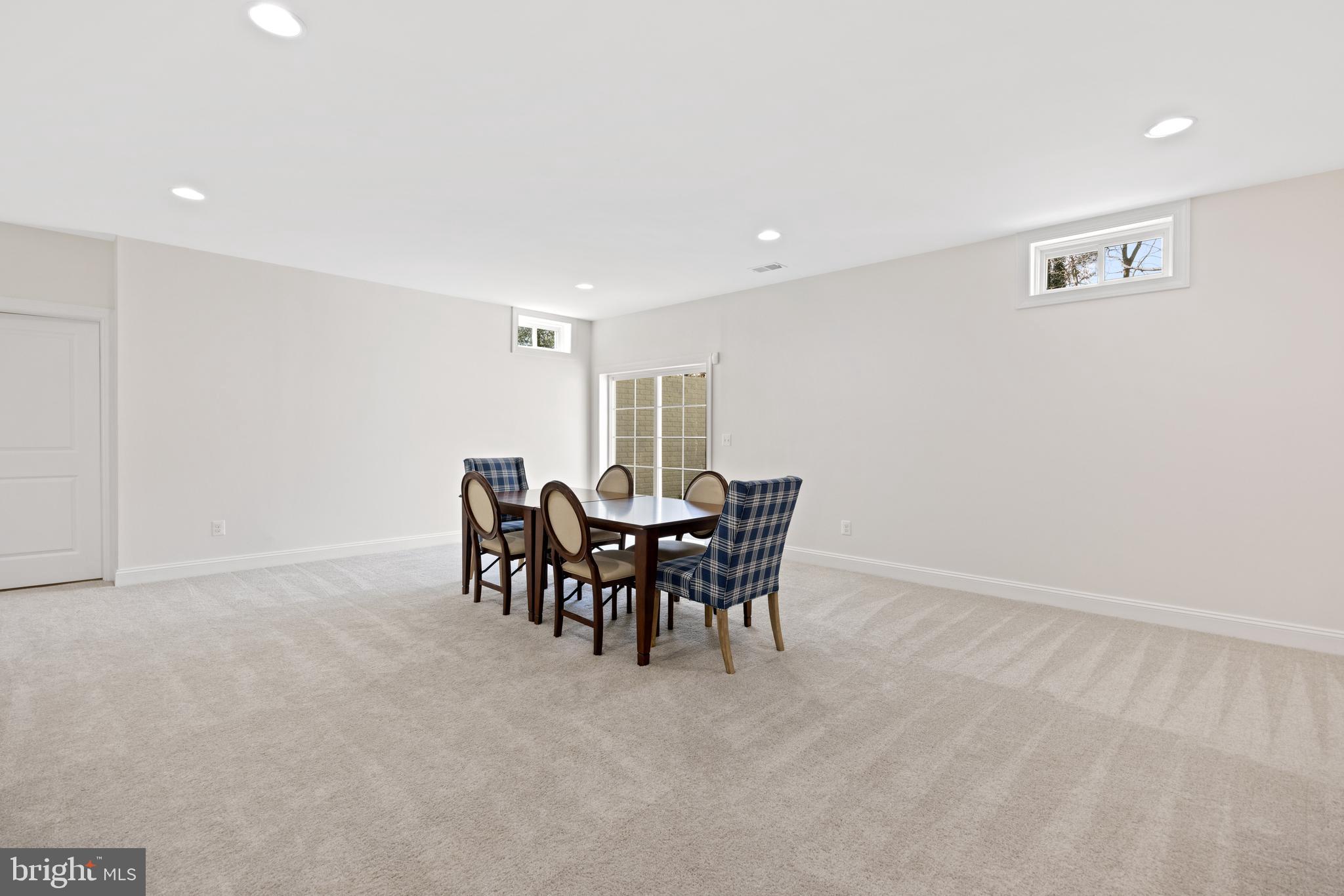 7869 Southdown Road Alexandria, VA 22308 - Photo 41 of 50 Large rec room with wide walk out stairwell