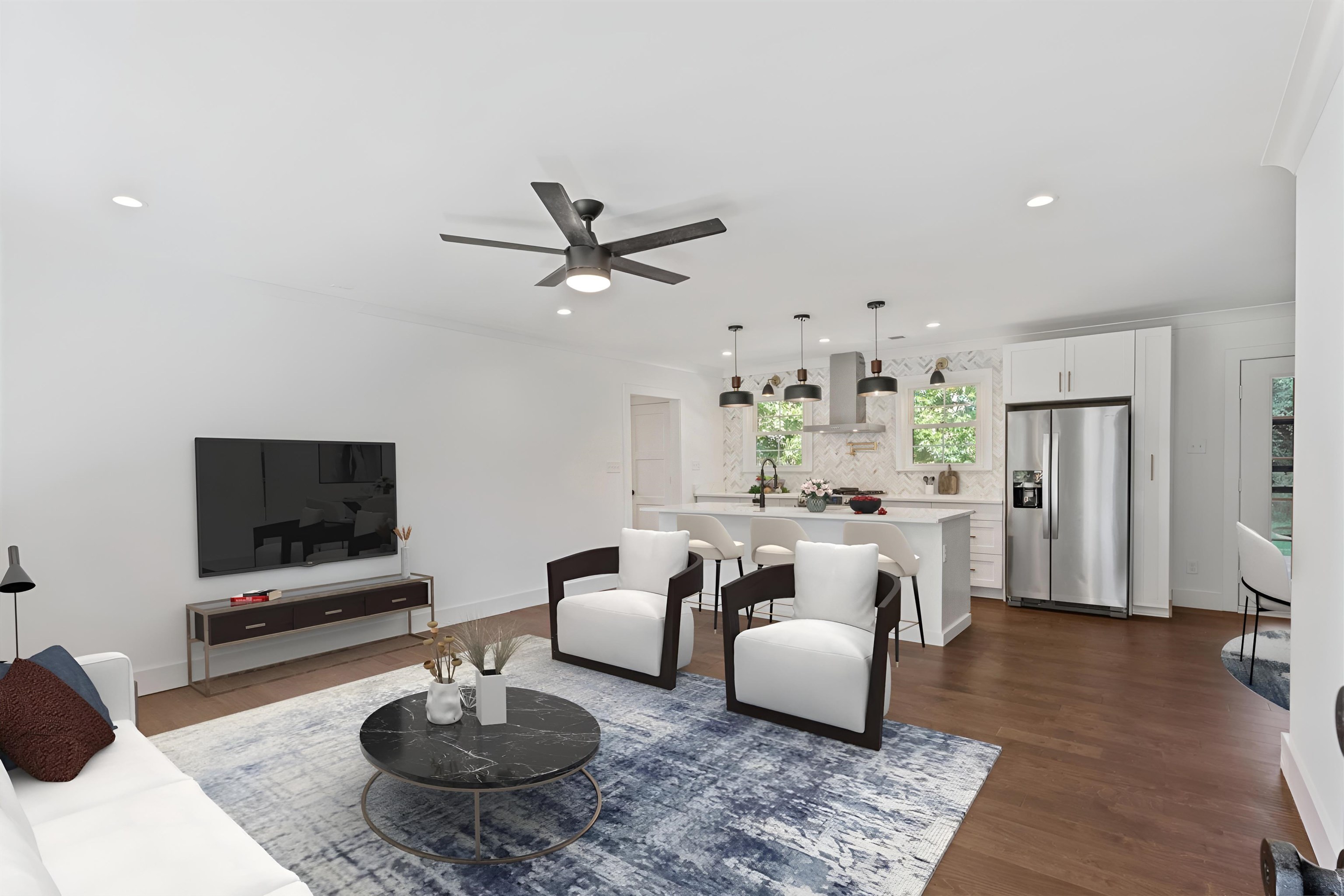 4944 Kaye Road Memphis, TN 38117 - Photo 3 of 25 a living room with furniture and a flat screen tv