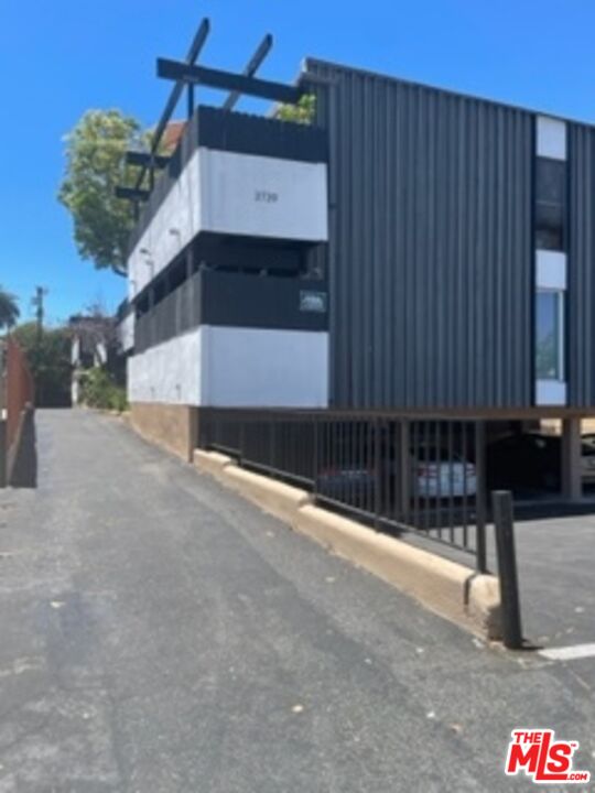 3739 McLaughlin Avenue Los Angeles, CA 90066 - Photo 11 of 11 a view of a street with parking space