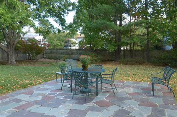 102 Standish Road Needham, MA 02492 - Photo 27 of 28 a view of a table and chairs in backyard yard