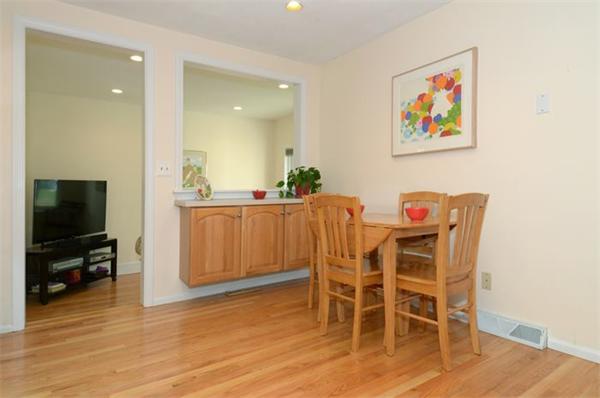 102 Standish Road Needham, MA 02492 - Photo 10 of 28 a dining room with furniture and wooden floor